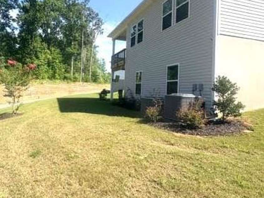 186 Guardian Gate Drive, Mooresville, NC 28115.  MLS# CAR4409616, YatesRealty ID 41690. Backyard