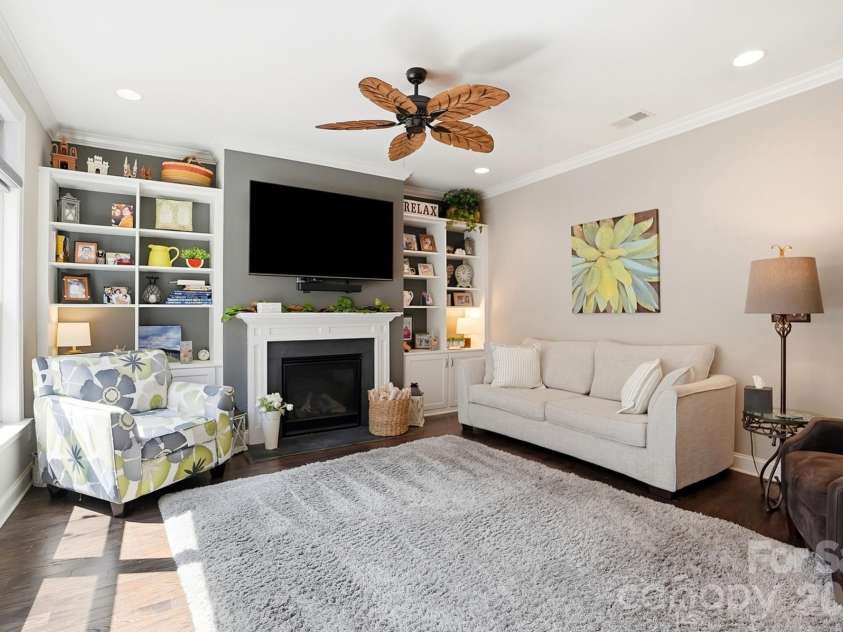 1100 Avalon Place, Matthews, NC 28104.  MLS# CAR4411415, YatesRealty ID 41696. FP with built ins and custom paint
