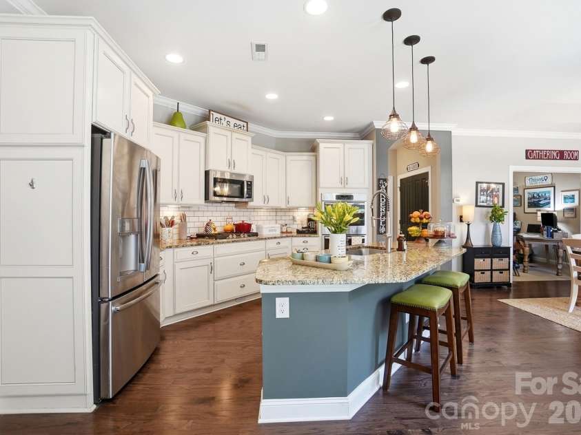 1100 Avalon Place, Matthews, NC 28104.  MLS# CAR4411415, YatesRealty ID 41696. Tons of storage in this kitchen!