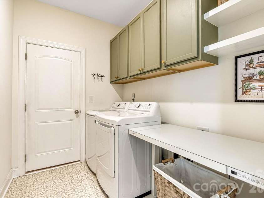 2011 Claybrook Lane, Denver, NC 28037.  MLS# CAR4410531, YatesRealty ID 41699. Laundry room/drop zone from garage