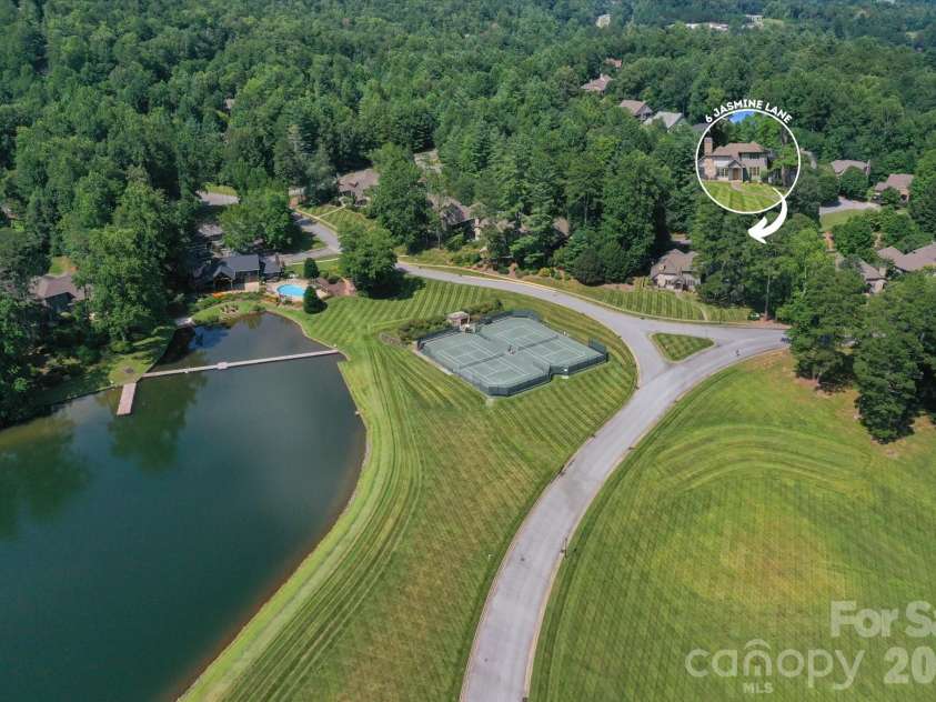 6 Jasmine Lane, Brevard, NC 28712.  MLS# CAR4410502, YatesRealty ID 41700. Across from Straus Lake