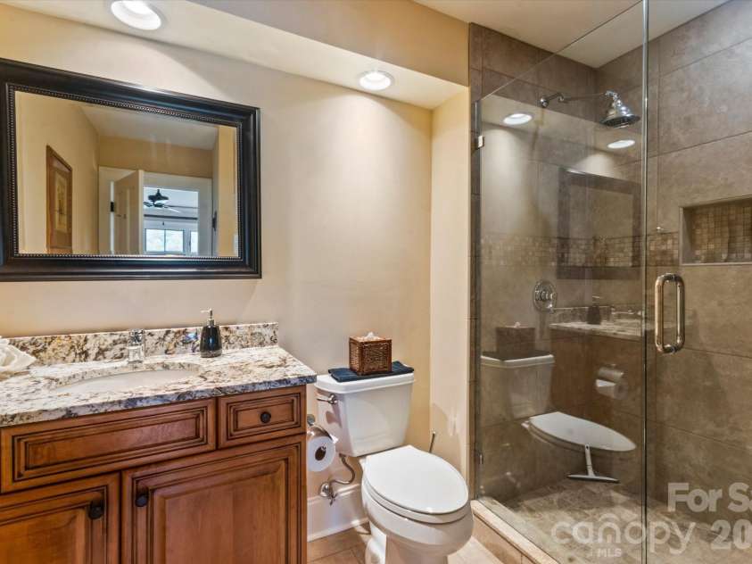 6 Jasmine Lane, Brevard, NC 28712.  MLS# CAR4410502, YatesRealty ID 41700. EnSuite Guest Bath
