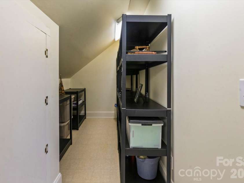 6 Jasmine Lane, Brevard, NC 28712.  MLS# CAR4410502, YatesRealty ID 41700. Large Storage Area with Shelving