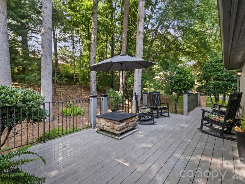 6 Jasmine Lane, Brevard, NC 28712.  MLS# CAR4410502, YatesRealty ID 41700. Private Side Deck with Fire Pit