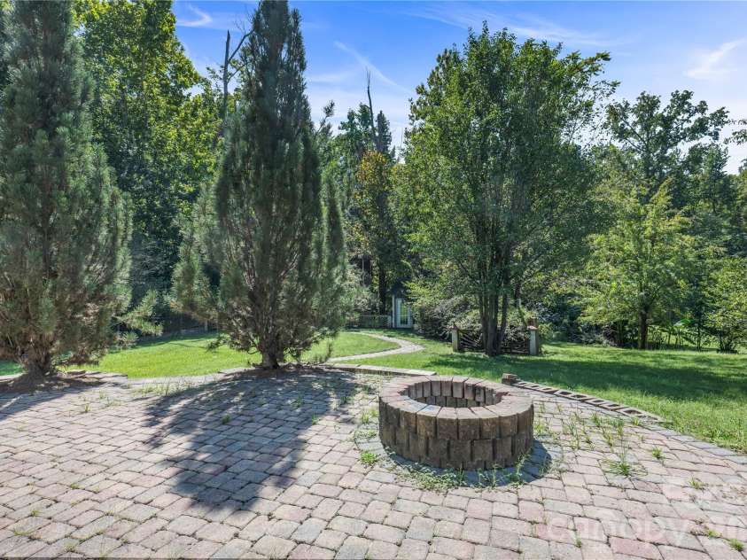 13631 William Stowe Drive, Charlotte, NC 28262.  MLS# CAR4411890, YatesRealty ID 41701. Fire Pitt