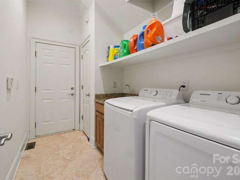 13631 William Stowe Drive, Charlotte, NC 28262.  MLS# CAR4411890, YatesRealty ID 41701. Laundry Room