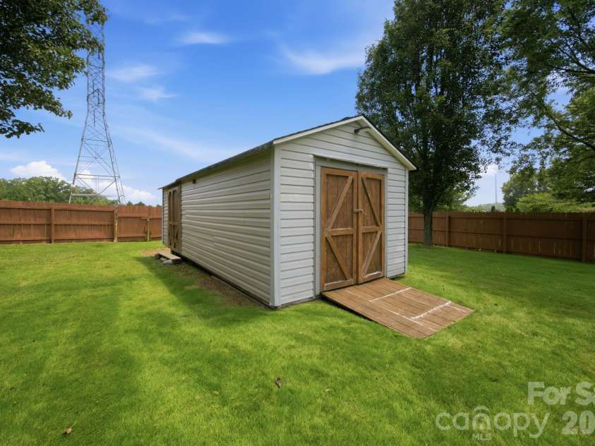 2426 Smith Cove Road, Denver, NC 28037.  MLS# CAR4401720, YatesRealty ID 41719. Back yard extended shed