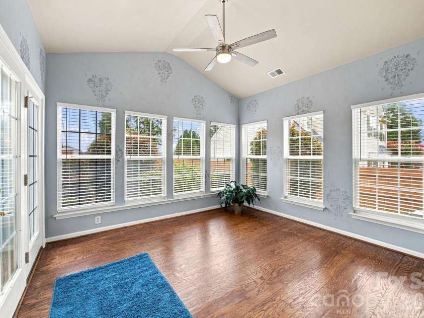 2426 Smith Cove Road, Denver, NC 28037.  MLS# CAR4401720, YatesRealty ID 41719. Sun room overlooking back yard