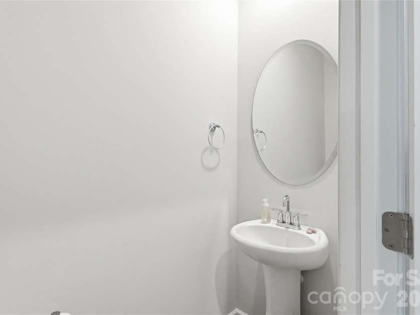 6116 Hailstone Road, Charlotte, NC 28215.  MLS# CAR4408502, YatesRealty ID 41726. Downstairs Half Bath