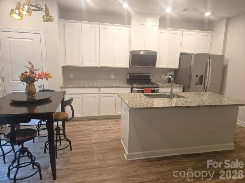 6116 Hailstone Road, Charlotte, NC 28215.  MLS# CAR4408502, YatesRealty ID 41726. Kitchen/DR Area