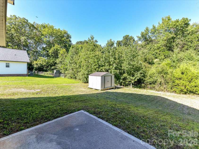 550 Claymon Road, Oakboro, NC 28129.  MLS# CAR4410271, YatesRealty ID 41729. Back Patio