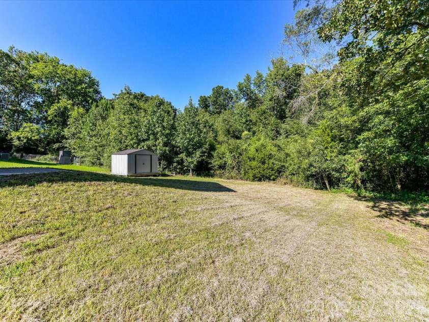 550 Claymon Road, Oakboro, NC 28129.  MLS# CAR4410271, YatesRealty ID 41729. Large Yard