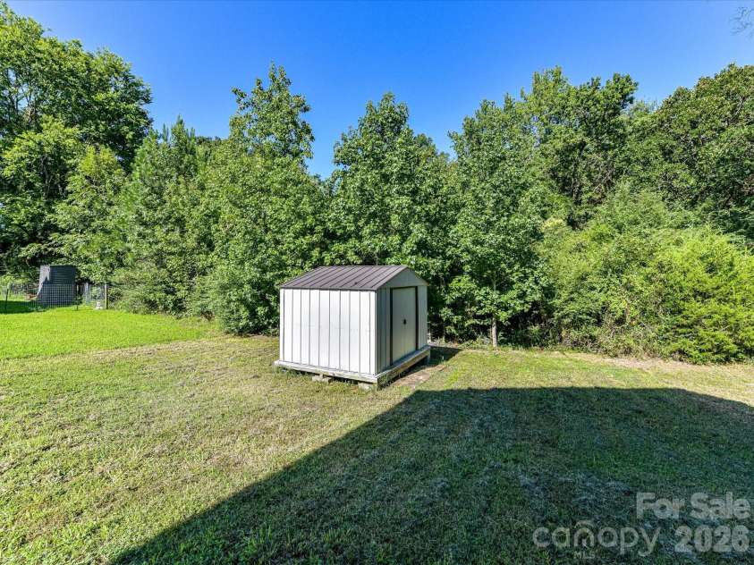 550 Claymon Road, Oakboro, NC 28129.  MLS# CAR4410271, YatesRealty ID 41729. Metal Storage Shed
