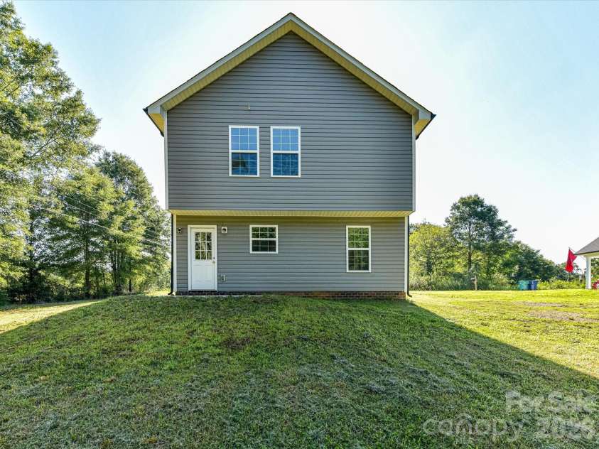 550 Claymon Road, Oakboro, NC 28129.  MLS# CAR4410271, YatesRealty ID 41729. Rear View