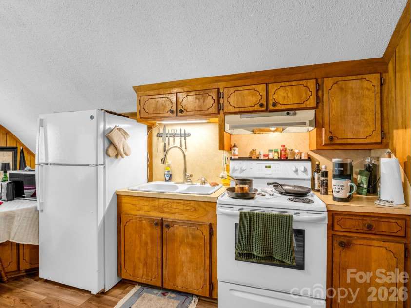 90 Mcentire Road, Tryon, NC 28782.  MLS# CAR4411875, YatesRealty ID 41733. 