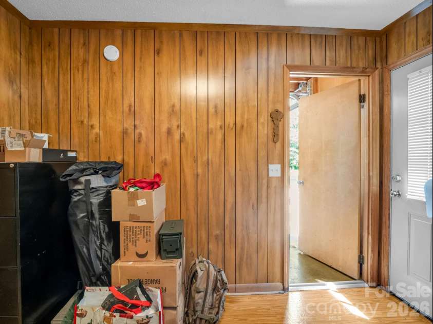 90 Mcentire Road, Tryon, NC 28782.  MLS# CAR4411875, YatesRealty ID 41733. Flex room on main level