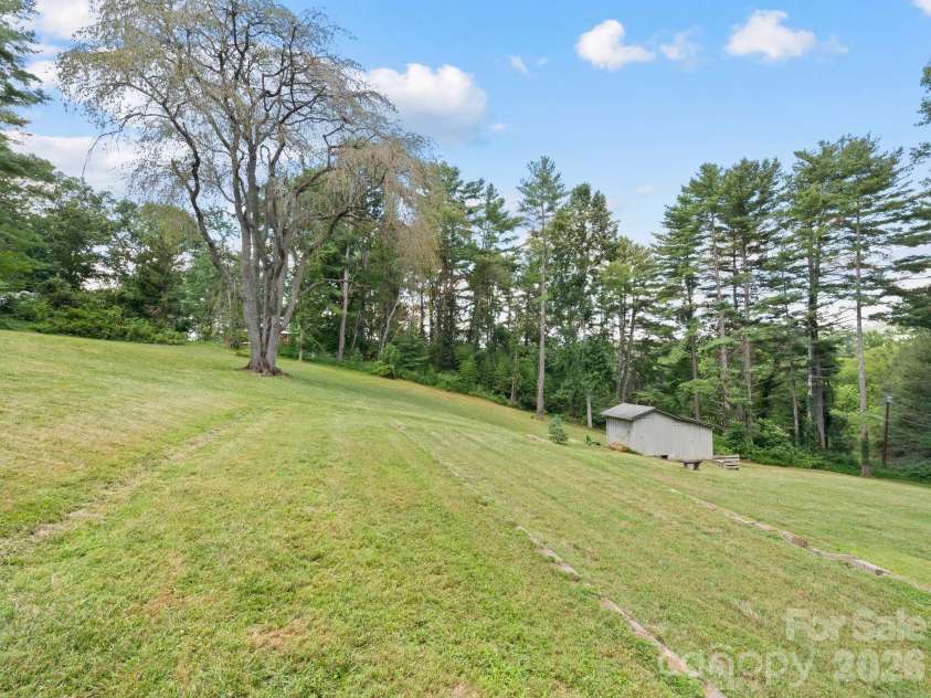 242 Hills Drive, Hendersonville, NC 28791.  MLS# CAR4410562, YatesRealty ID 41745. 