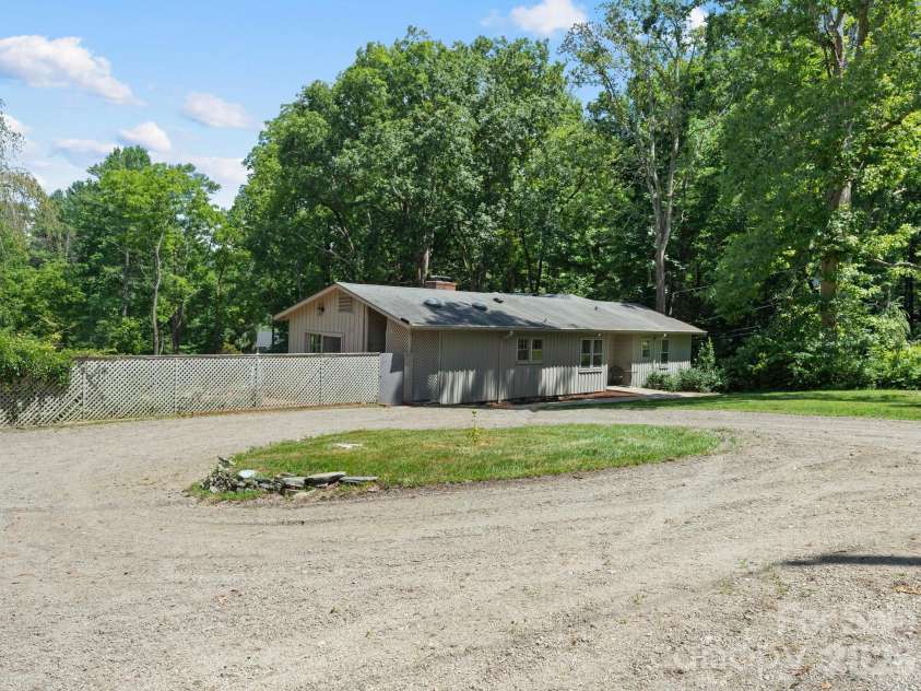 242 Hills Drive, Hendersonville, NC 28791.  MLS# CAR4410562, YatesRealty ID 41745. 