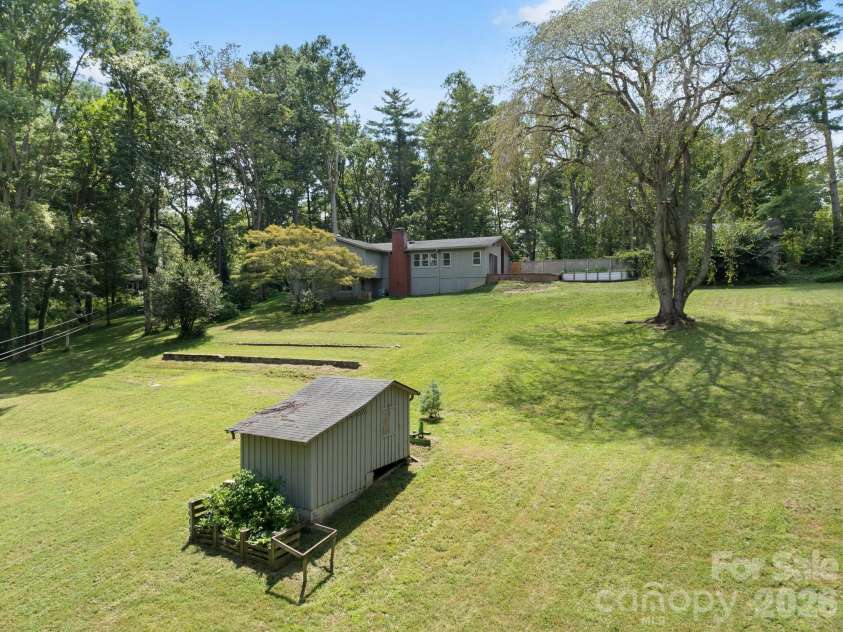 242 Hills Drive, Hendersonville, NC 28791.  MLS# CAR4410562, YatesRealty ID 41745. Back view