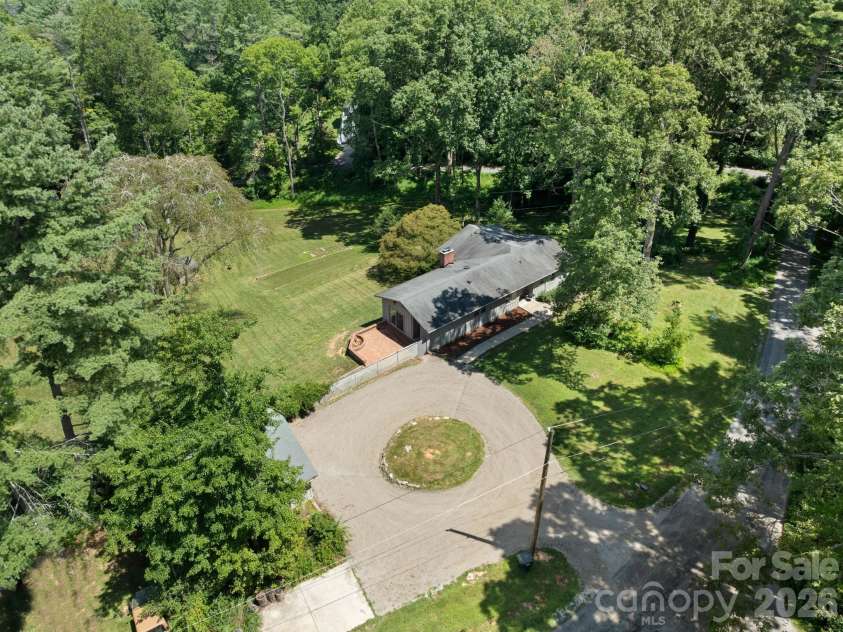 242 Hills Drive, Hendersonville, NC 28791.  MLS# CAR4410562, YatesRealty ID 41745. Circular driveway
