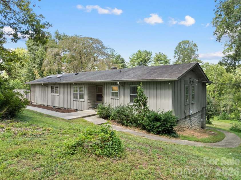 242 Hills Drive, Hendersonville, NC 28791.  MLS# CAR4410562, YatesRealty ID 41745. Front view