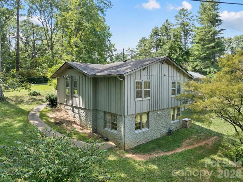 242 Hills Drive, Hendersonville, NC 28791.  MLS# CAR4410562, YatesRealty ID 41745. Rear view