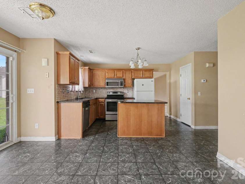 9813 Baxter Caldwell Drive, Charlotte, NC 28213.  MLS# CAR4411650, YatesRealty ID 41769. 