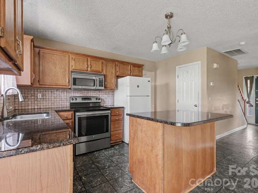 9813 Baxter Caldwell Drive, Charlotte, NC 28213.  MLS# CAR4411650, YatesRealty ID 41769. 
