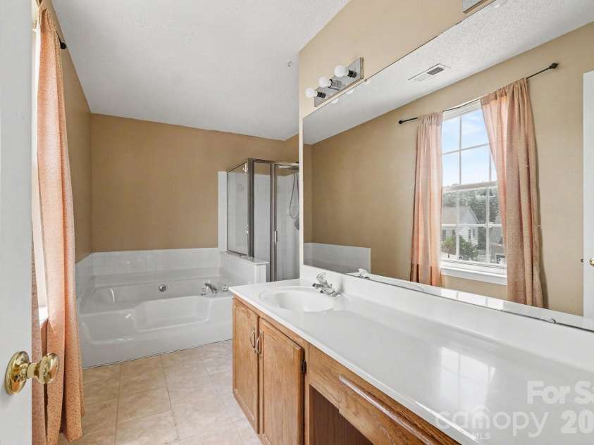 9813 Baxter Caldwell Drive, Charlotte, NC 28213.  MLS# CAR4411650, YatesRealty ID 41769. 