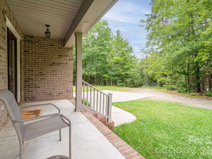 344 John Logan Lane, Gastonia, NC 28056.  MLS# CAR4410445, YatesRealty ID 41771. Front porch