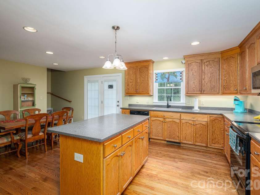344 John Logan Lane, Gastonia, NC 28056.  MLS# CAR4410445, YatesRealty ID 41771. Kitchen center island