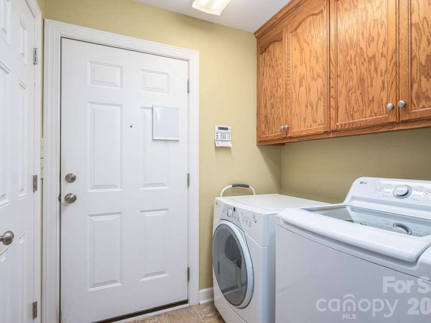 344 John Logan Lane, Gastonia, NC 28056.  MLS# CAR4410445, YatesRealty ID 41771. Laundry room, off kitchen