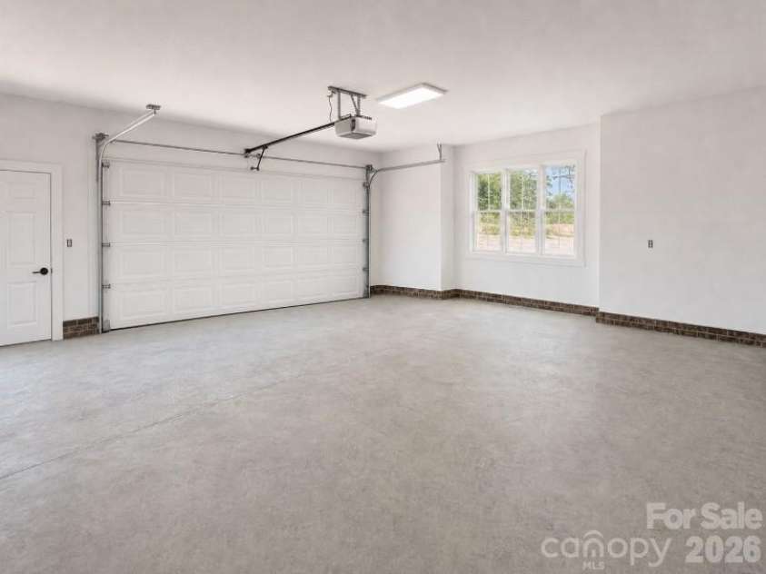509 Simpson Road, Locust, NC 28097.  MLS# CAR4407776, YatesRealty ID 41779. Finished garage * Rendering *