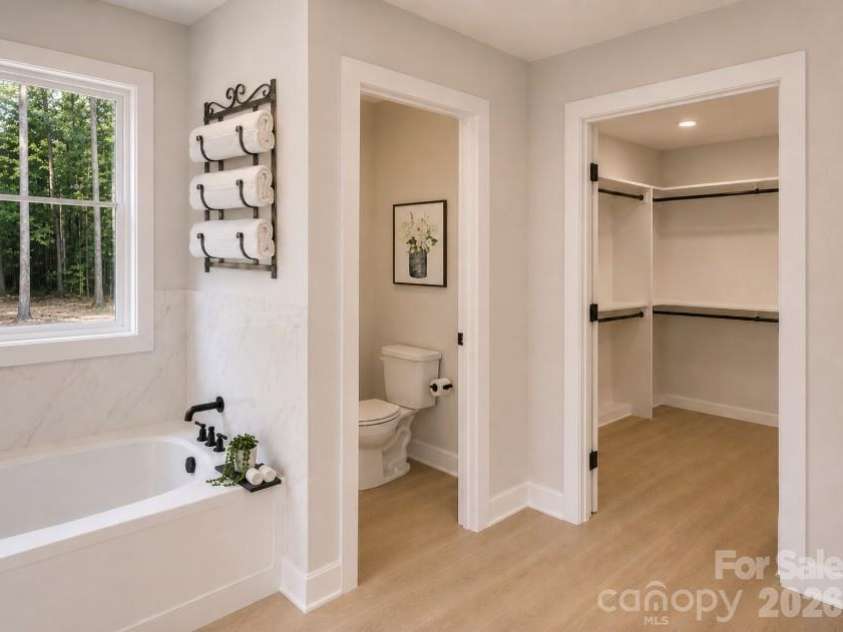 509 Simpson Road, Locust, NC 28097.  MLS# CAR4407776, YatesRealty ID 41779. Primary bath *Rendering*