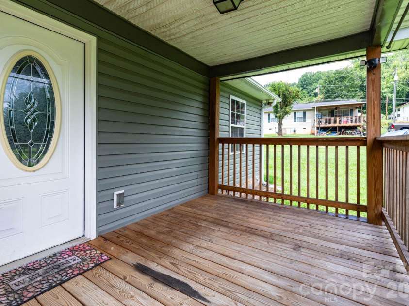40 Eddie Drive, Old Fort, NC 28762.  MLS# CAR4409389, YatesRealty ID 41780. Covered Front Porch