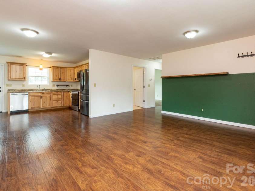 40 Eddie Drive, Old Fort, NC 28762.  MLS# CAR4409389, YatesRealty ID 41780. Living Room/Dining Area