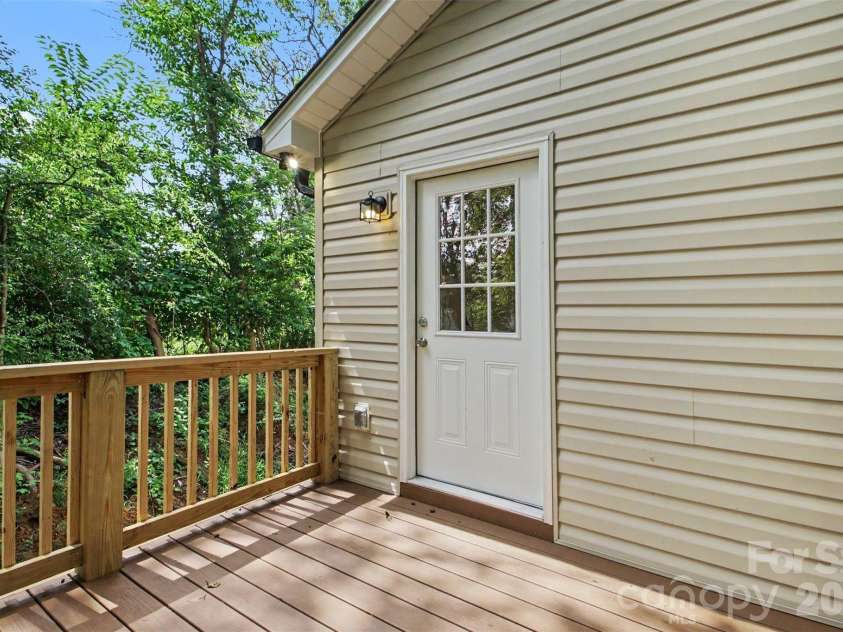 155 Corban Avenue, Concord, NC 28025.  MLS# CAR4405826, YatesRealty ID 41785. Back deck off of laundry!