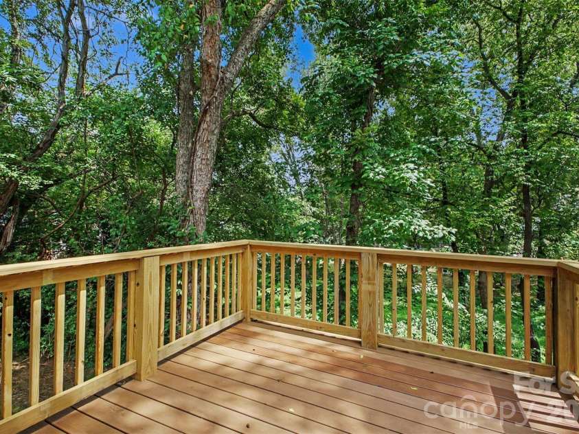 155 Corban Avenue, Concord, NC 28025.  MLS# CAR4405826, YatesRealty ID 41785. Back deck off of laundry!