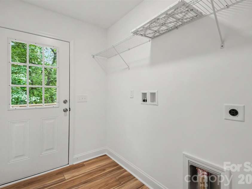 155 Corban Avenue, Concord, NC 28025.  MLS# CAR4405826, YatesRealty ID 41785. Laundry off of kitchen