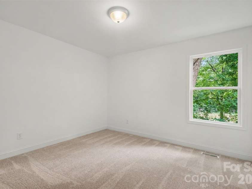 155 Corban Avenue, Concord, NC 28025.  MLS# CAR4405826, YatesRealty ID 41785. Primary bedroom