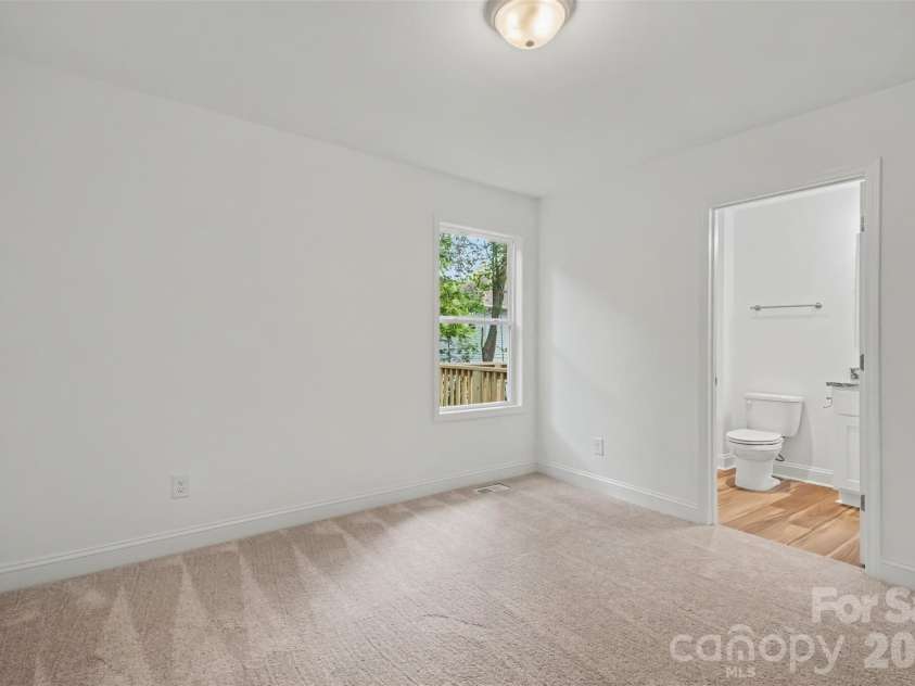 155 Corban Avenue, Concord, NC 28025.  MLS# CAR4405826, YatesRealty ID 41785. Primary Bedroom