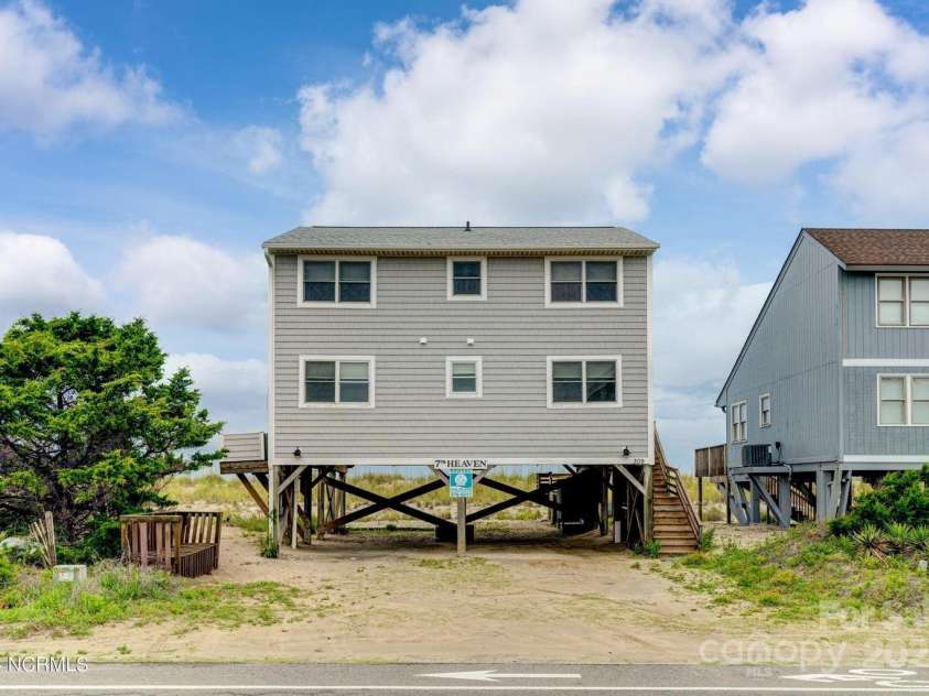 309 Beach Drive, Oak Island, NC 28465.  MLS# CAR4243105, YatesRealty ID 4179. 