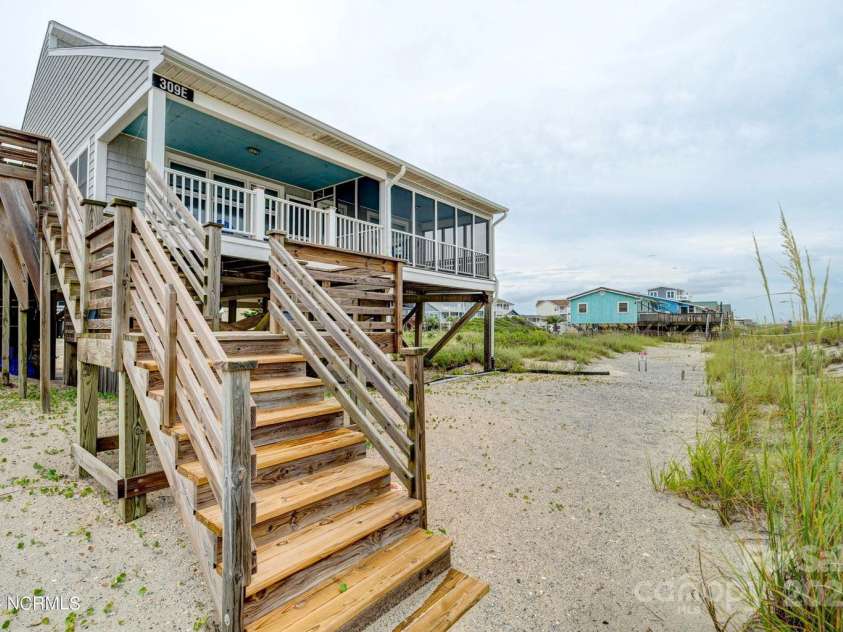 309 Beach Drive, Oak Island, NC 28465.  MLS# CAR4243105, YatesRealty ID 4179. 