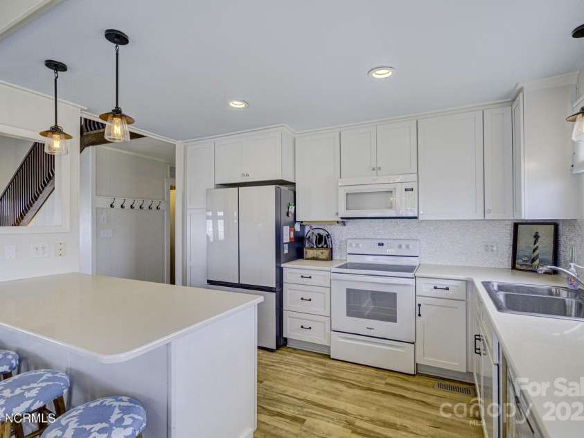 309 Beach Drive, Oak Island, NC 28465.  MLS# CAR4243105, YatesRealty ID 4179. 