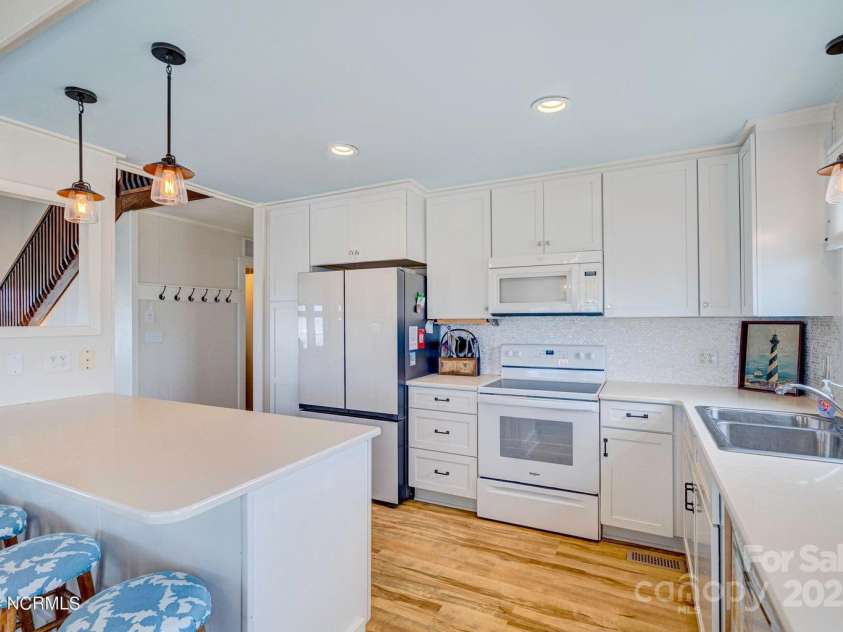 309 Beach Drive, Oak Island, NC 28465.  MLS# CAR4243105, YatesRealty ID 4179. 