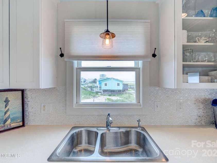 309 Beach Drive, Oak Island, NC 28465.  MLS# CAR4243105, YatesRealty ID 4179. 