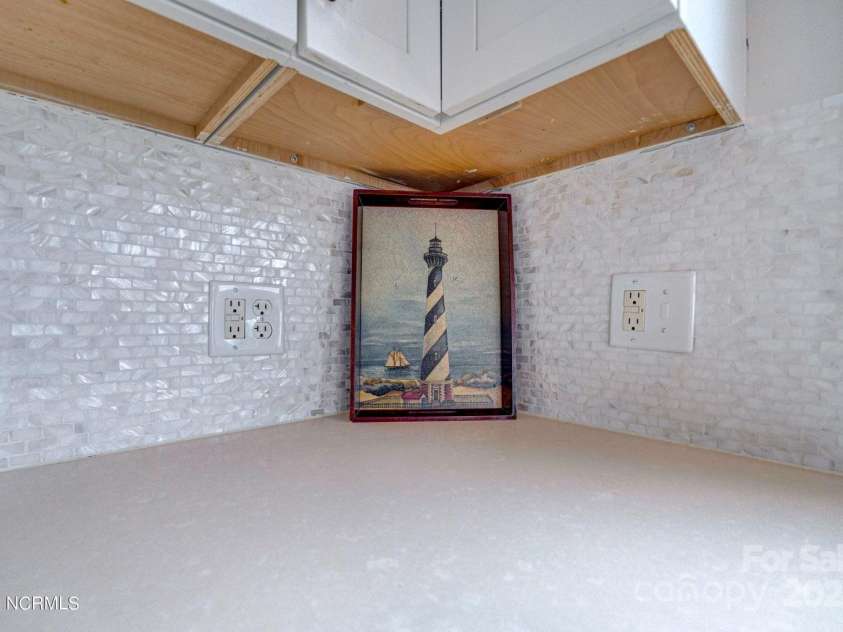 309 Beach Drive, Oak Island, NC 28465.  MLS# CAR4243105, YatesRealty ID 4179. 