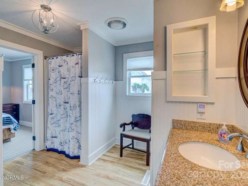 309 Beach Drive, Oak Island, NC 28465.  MLS# CAR4243105, YatesRealty ID 4179. 