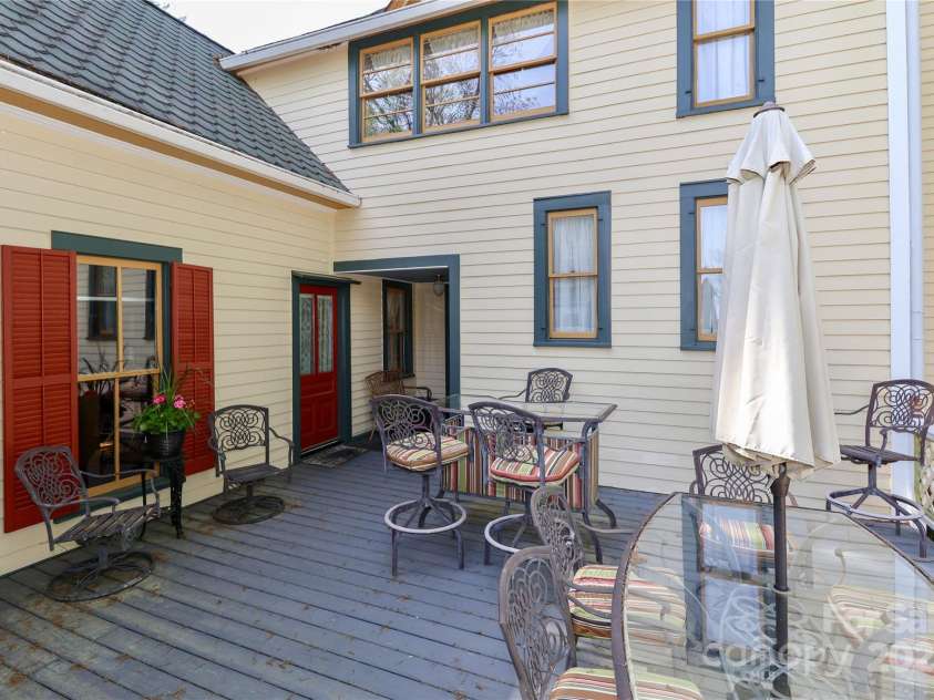 235 Walnut Street, Statesville, NC 28677.  MLS# CAR4134450, YatesRealty ID 418. Back Deck overlooking the grounds