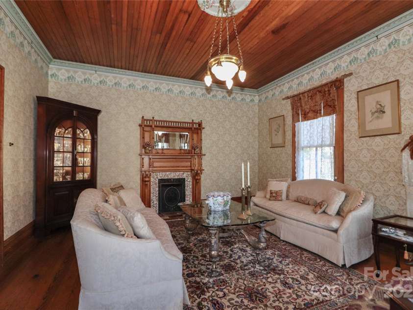 235 Walnut Street, Statesville, NC 28677.  MLS# CAR4134450, YatesRealty ID 418. Front Living Room
